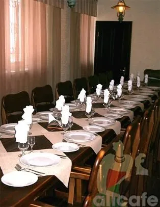Каминъ
